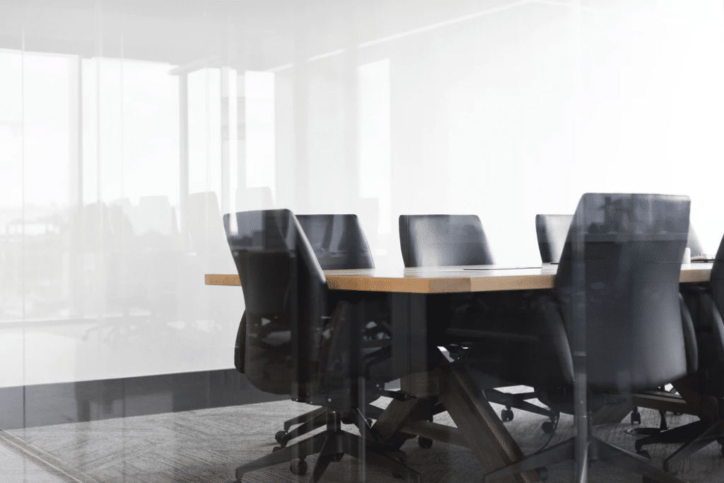 Rolling chairs around conference table