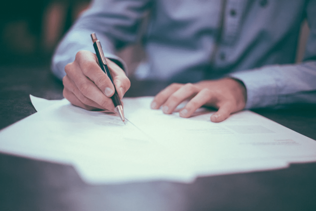 Man writing plans